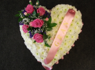 massed heart - beautiful floral tribute for man or lady available with ribbon at addition cost of £5.00