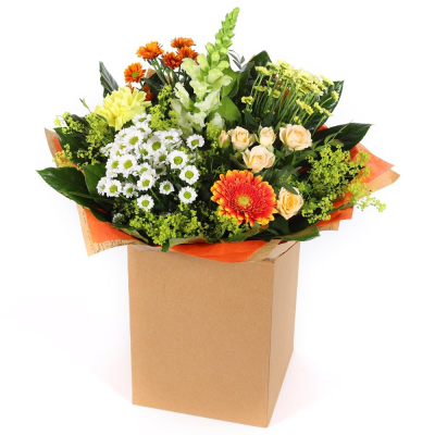 Citrus Sunrise - Capture the essence of a golden meadow with this stunning bouquet of yellow, white, and orange flowers. Presented in a stylish packaging it's perfect for adding natural beauty to any space